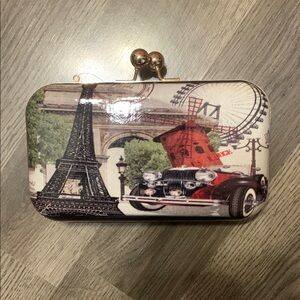 Black and Red Clutch with Parisian Print and Hard-Shell Design